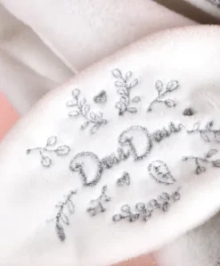 Doudou et Compagnie Doudou plat pétales Ours Gris - 25 cm - Collection Anniversaire