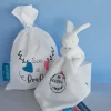 Doudou et Compagnie Sac à doudou + Doudou lapin "Mon Doudou + fort que tout " 10 cm - Unicef