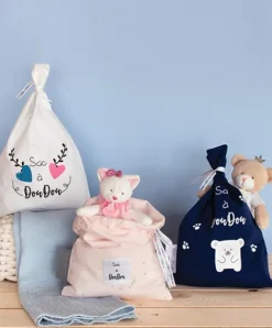 Doudou et Compagnie Sac à Doudou en coton à motifs - Modèle aléatoire